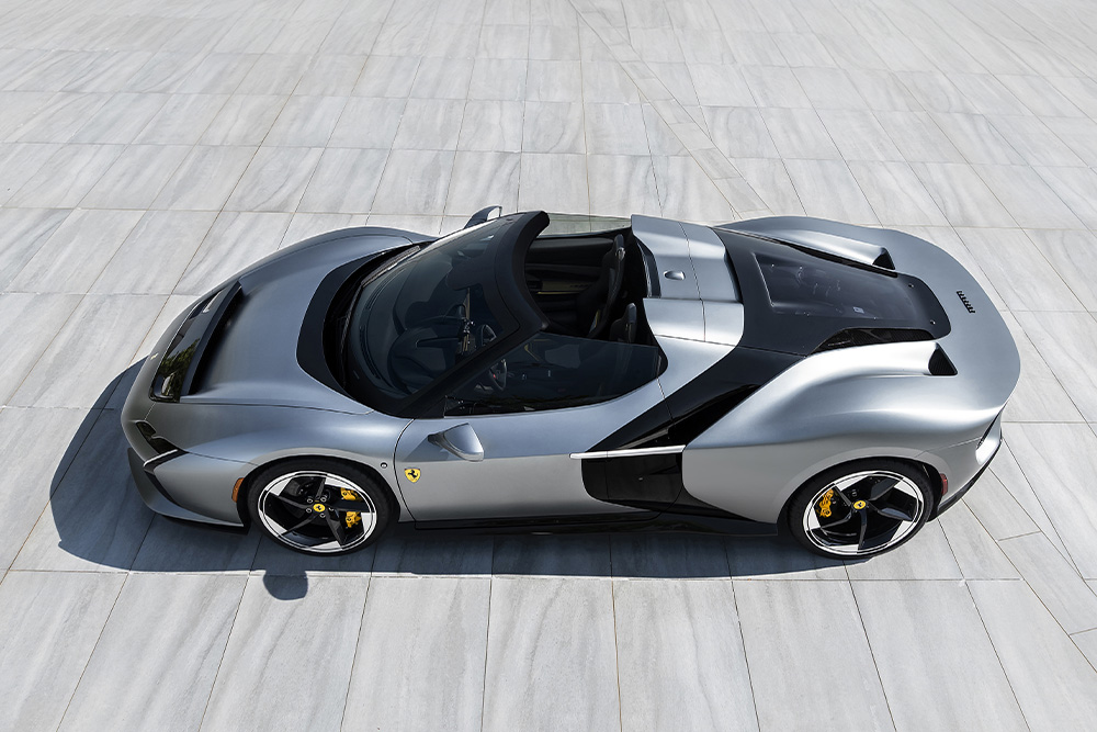 Bespoke silver Ferrari HC25 one-off supercar viewed from above, highlighting its unique open-top spider layout.