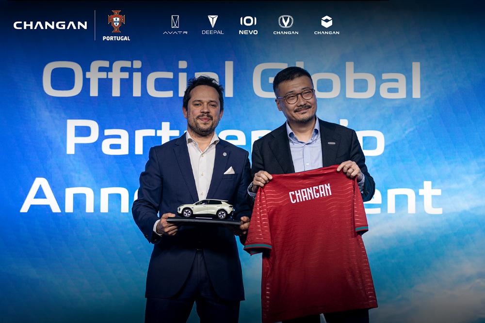 Changan Automobile official global partnership announcement with Portugal holding soccer jersey and car model.