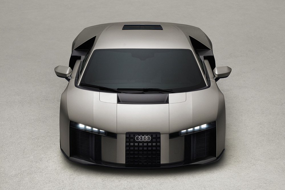 Top-down front view of a sleek silver Audi Nuvolari Quattro concept sports car parked on a clean studio floor.