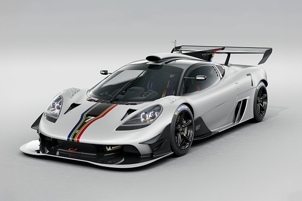 Sleek silver GMA T.50s Niki Lauda track-focused supercar featuring colorful stripes on the front hood.